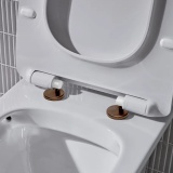 Lifestyle image of the Tavistock Loft Brushed Bronze Wrap Over Toilet Seat Hinge Cover Caps